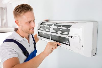 Important-Considerations-for-AC-Installation-and-Update – Copy HVAC technician cleaning and repairing a ductless mini split AC in Avondale, AZ